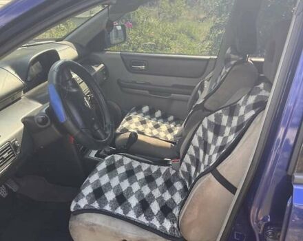 Синий Ниссан ИксТрейл, объемом двигателя 2 л и пробегом 246 тыс. км за 5400 $, фото 18 на Automoto.ua