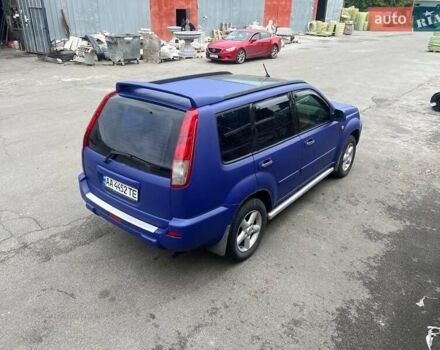 Синий Ниссан ИксТрейл, объемом двигателя 2 л и пробегом 350 тыс. км за 6500 $, фото 1 на Automoto.ua