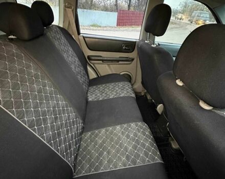 Синий Ниссан ИксТрейл, объемом двигателя 2.2 л и пробегом 327 тыс. км за 3300 $, фото 10 на Automoto.ua