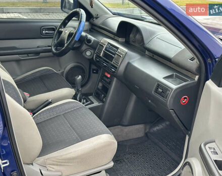 Синий Ниссан ИксТрейл, объемом двигателя 2 л и пробегом 247 тыс. км за 6200 $, фото 24 на Automoto.ua