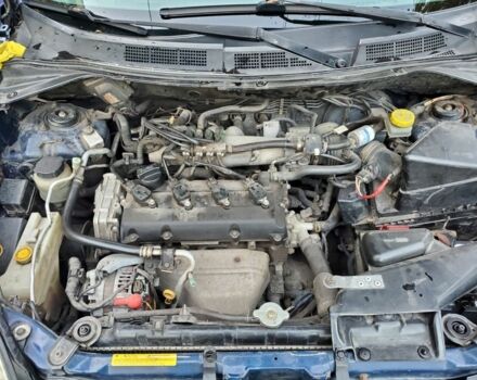 Синій Ніссан ІксТрейл, об'ємом двигуна 2 л та пробігом 300 тис. км за 4400 $, фото 5 на Automoto.ua