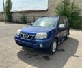 Синий Ниссан ИксТрейл, объемом двигателя 2 л и пробегом 350 тыс. км за 4500 $, фото 1 на Automoto.ua