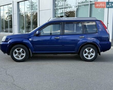 Синий Ниссан ИксТрейл, объемом двигателя 2.5 л и пробегом 330 тыс. км за 7500 $, фото 3 на Automoto.ua