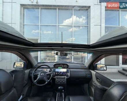 Синий Ниссан ИксТрейл, объемом двигателя 2.5 л и пробегом 330 тыс. км за 7500 $, фото 8 на Automoto.ua