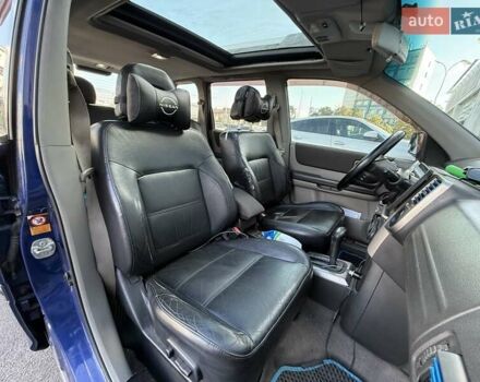 Синий Ниссан ИксТрейл, объемом двигателя 2.5 л и пробегом 330 тыс. км за 7500 $, фото 13 на Automoto.ua
