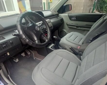 Синий Ниссан ИксТрейл, объемом двигателя 2 л и пробегом 500 тыс. км за 5400 $, фото 5 на Automoto.ua