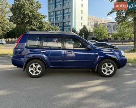 Синий Ниссан ИксТрейл, объемом двигателя 2.5 л и пробегом 330 тыс. км за 7500 $, фото 7 на Automoto.ua