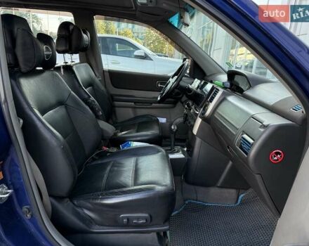 Синий Ниссан ИксТрейл, объемом двигателя 2.5 л и пробегом 330 тыс. км за 7500 $, фото 11 на Automoto.ua