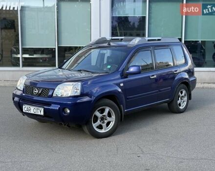 Синий Ниссан ИксТрейл, объемом двигателя 2.5 л и пробегом 330 тыс. км за 7500 $, фото 2 на Automoto.ua