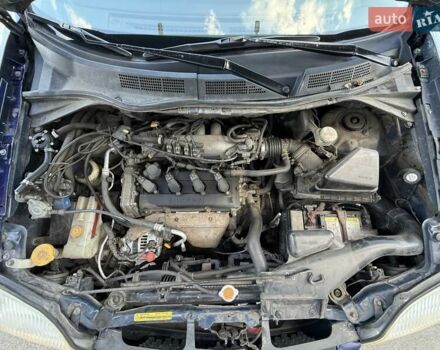 Синий Ниссан ИксТрейл, объемом двигателя 2.5 л и пробегом 330 тыс. км за 7500 $, фото 24 на Automoto.ua