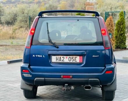 Синий Ниссан ИксТрейл, объемом двигателя 2.2 л и пробегом 100 тыс. км за 2750 $, фото 4 на Automoto.ua