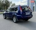 Синий Ниссан ИксТрейл, объемом двигателя 2.5 л и пробегом 330 тыс. км за 7500 $, фото 4 на Automoto.ua