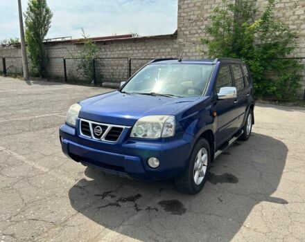 Синий Ниссан ИксТрейл, объемом двигателя 2 л и пробегом 340 тыс. км за 4000 $, фото 1 на Automoto.ua
