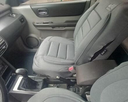 Синий Ниссан ИксТрейл, объемом двигателя 2 л и пробегом 500 тыс. км за 5400 $, фото 8 на Automoto.ua