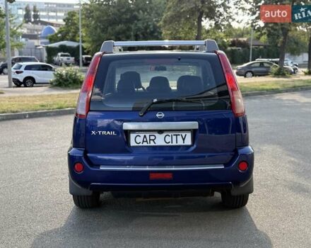 Синий Ниссан ИксТрейл, объемом двигателя 2.5 л и пробегом 330 тыс. км за 7500 $, фото 5 на Automoto.ua