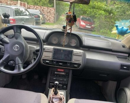 Синій Ніссан ІксТрейл, об'ємом двигуна 2 л та пробігом 300 тис. км за 6000 $, фото 3 на Automoto.ua