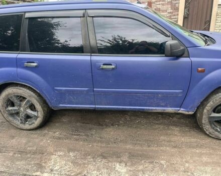 Синій Ніссан ІксТрейл, об'ємом двигуна 2 л та пробігом 300 тис. км за 6000 $, фото 1 на Automoto.ua