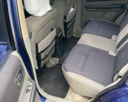 Синій Ніссан ІксТрейл, об'ємом двигуна 2 л та пробігом 300 тис. км за 6000 $, фото 4 на Automoto.ua