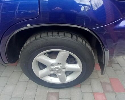 Синий Ниссан ИксТрейл, объемом двигателя 2 л и пробегом 500 тыс. км за 5400 $, фото 3 на Automoto.ua