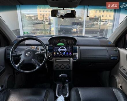 Синий Ниссан ИксТрейл, объемом двигателя 2.5 л и пробегом 330 тыс. км за 7500 $, фото 9 на Automoto.ua