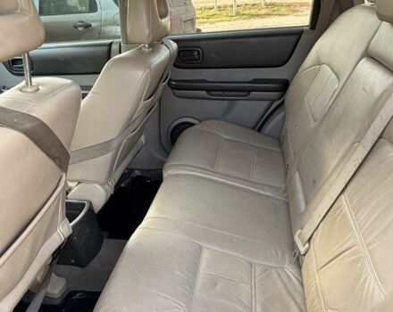 Синий Ниссан ИксТрейл, объемом двигателя 2 л и пробегом 400 тыс. км за 2850 $, фото 11 на Automoto.ua