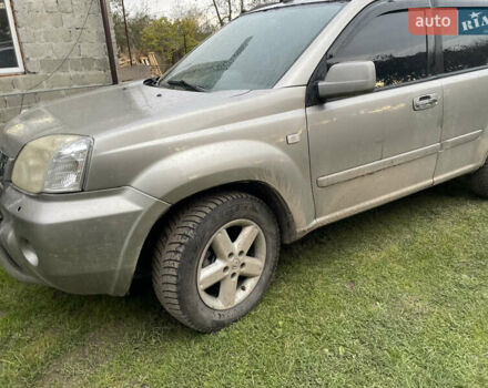 Синий Ниссан ИксТрейл, объемом двигателя 2.4 л и пробегом 299 тыс. км за 4600 $, фото 11 на Automoto.ua