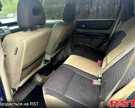 Синий Ниссан ИксТрейл, объемом двигателя 2.2 л и пробегом 292 тыс. км за 5800 $, фото 8 на Automoto.ua