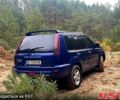 Синий Ниссан ИксТрейл, объемом двигателя 2.2 л и пробегом 292 тыс. км за 5800 $, фото 4 на Automoto.ua