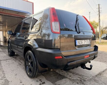 Синий Ниссан ИксТрейл, объемом двигателя 2 л и пробегом 400 тыс. км за 2850 $, фото 5 на Automoto.ua