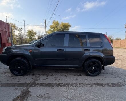 Синий Ниссан ИксТрейл, объемом двигателя 2 л и пробегом 400 тыс. км за 2850 $, фото 4 на Automoto.ua