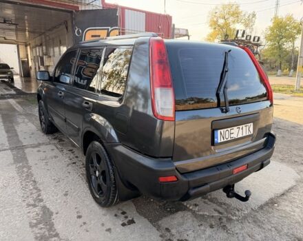 Синий Ниссан ИксТрейл, объемом двигателя 2 л и пробегом 400 тыс. км за 2850 $, фото 6 на Automoto.ua