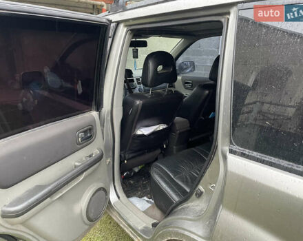 Синий Ниссан ИксТрейл, объемом двигателя 2.4 л и пробегом 299 тыс. км за 4600 $, фото 12 на Automoto.ua