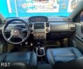 Синий Ниссан ИксТрейл, объемом двигателя 2.2 л и пробегом 320 тыс. км за 3500 $, фото 4 на Automoto.ua
