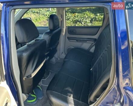 Синий Ниссан ИксТрейл, объемом двигателя 2.2 л и пробегом 274 тыс. км за 5450 $, фото 4 на Automoto.ua