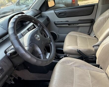 Синий Ниссан ИксТрейл, объемом двигателя 2 л и пробегом 400 тыс. км за 2850 $, фото 10 на Automoto.ua