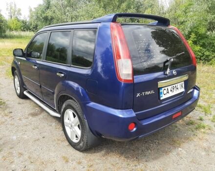 Синий Ниссан ИксТрейл, объемом двигателя 2 л и пробегом 400 тыс. км за 5900 $, фото 5 на Automoto.ua