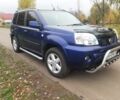 Синий Ниссан ИксТрейл, объемом двигателя 2 л и пробегом 400 тыс. км за 5900 $, фото 2 на Automoto.ua