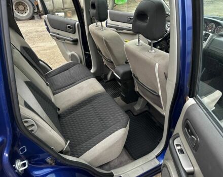 Синий Ниссан ИксТрейл, объемом двигателя 2.2 л и пробегом 280 тыс. км за 3699 $, фото 7 на Automoto.ua