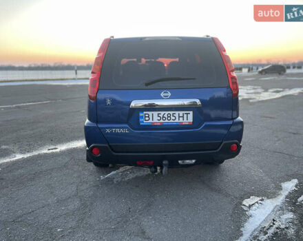 Синий Ниссан ИксТрейл, объемом двигателя 2 л и пробегом 210 тыс. км за 8900 $, фото 2 на Automoto.ua