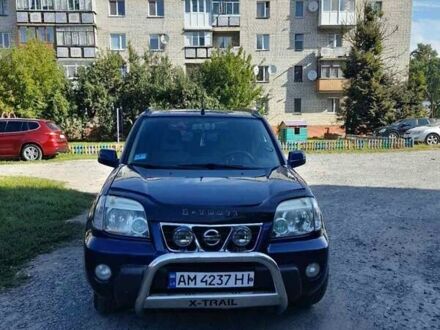 Синий Ниссан ИксТрейл, объемом двигателя 2 л и пробегом 190 тыс. км за 5000 $, фото 1 на Automoto.ua