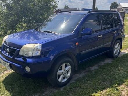 Синій Ніссан ІксТрейл, об'ємом двигуна 2 л та пробігом 246 тис. км за 5400 $, фото 1 на Automoto.ua