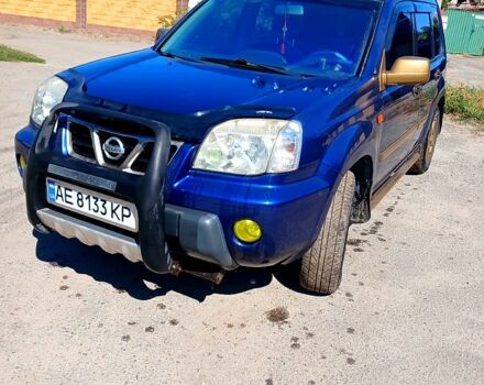 Синій Ніссан ІксТрейл, об'ємом двигуна 2 л та пробігом 250 тис. км за 6000 $, фото 1 на Automoto.ua