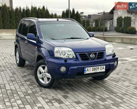 Синій Ніссан ІксТрейл, об'ємом двигуна 2 л та пробігом 247 тис. км за 6200 $, фото 1 на Automoto.ua