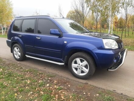Синій Ніссан ІксТрейл, об'ємом двигуна 2 л та пробігом 400 тис. км за 5900 $, фото 1 на Automoto.ua