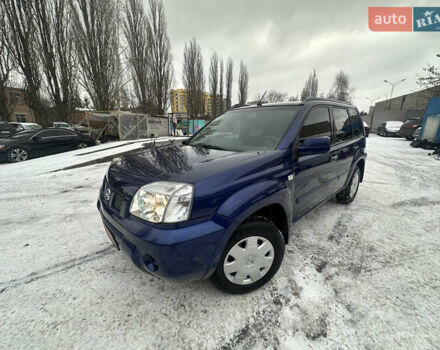 Синий Ниссан ИксТрейл, объемом двигателя 2 л и пробегом 228 тыс. км за 6499 $, фото 1 на Automoto.ua