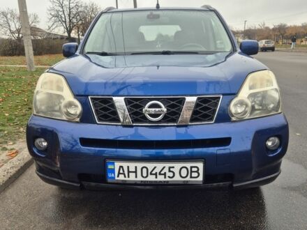 Синий Ниссан ИксТрейл, объемом двигателя 2 л и пробегом 204 тыс. км за 10000 $, фото 1 на Automoto.ua