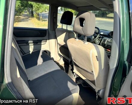 Зеленый Ниссан ИксТрейл, объемом двигателя 2.2 л и пробегом 300 тыс. км за 3199 $, фото 10 на Automoto.ua