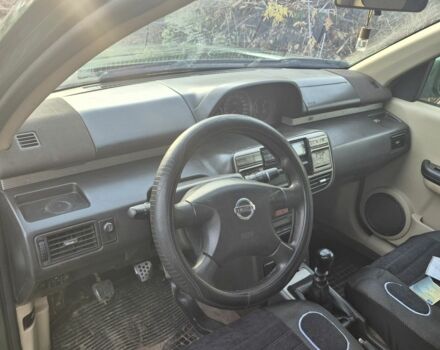 Зеленый Ниссан ИксТрейл, объемом двигателя 2 л и пробегом 334 тыс. км за 3974 $, фото 2 на Automoto.ua