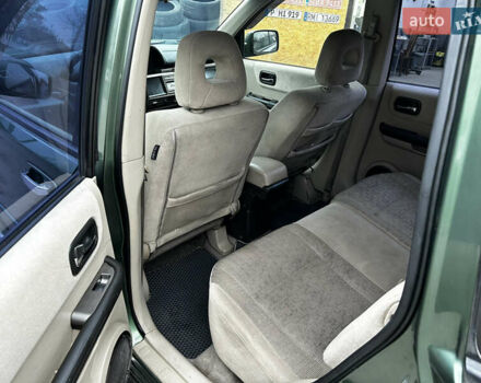 Зеленый Ниссан ИксТрейл, объемом двигателя 2 л и пробегом 308 тыс. км за 5700 $, фото 11 на Automoto.ua