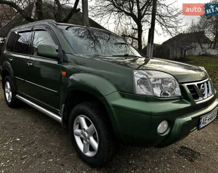 Зеленый Ниссан ИксТрейл, объемом двигателя 2 л и пробегом 308 тыс. км за 5700 $, фото 1 на Automoto.ua